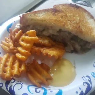 1/2 Phat Philly with waffle fries.