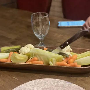 a plate of vegetables on a table
