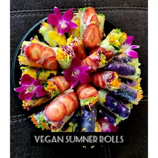 a plate of sushi rolls