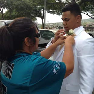 Putting his buttoner on