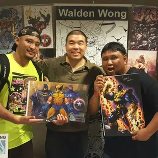 Comic book artist Walden Wong with comic fans.