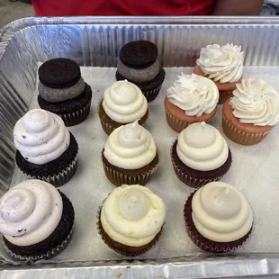 Oreo, carrot and chcocolate with cherry frosting cupcakes.