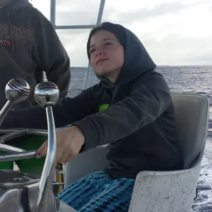 Captain Mike let my daughter drive the boat for a minute.