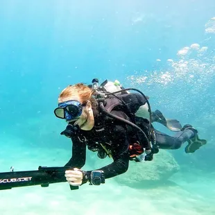 My Instructor, Julian checking out my SCUBAJET DPV.   He was a natural!