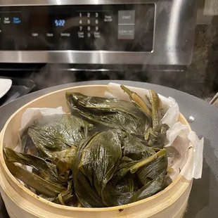 a bowl of steamed leafy greens