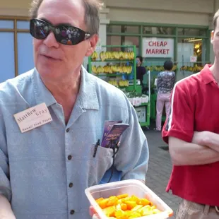 Matthew with Fresh Pineapple and Li Hing Powder - Yum!