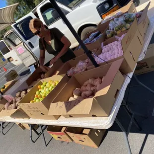 a woman selling produce