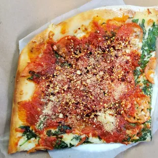 Spinach, Garlic, &amp; Tomato slice, which I had them add some tomato sauce, then I added some hot peppers &amp; cheese.