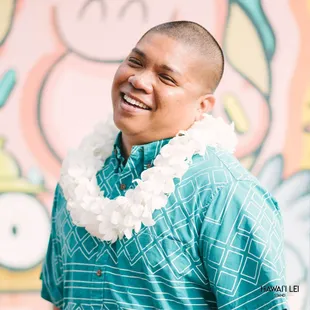 Dbl White Orchid https://hawaiileistand.com/honolulu-hawaii-lei-stand-by-beretania-florist/double-dendro-orchid-lei-white.html