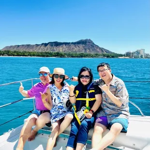 Hangin&apos; out in the bow on our way to the Snorkel Spot - Diamond Head in the Background
