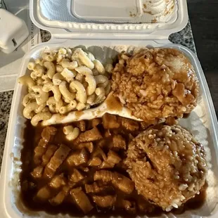 a meal in a styrofoam container