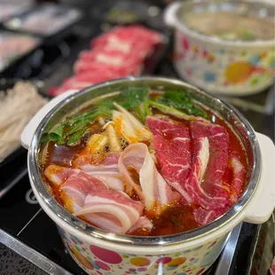 Tom yum broth with pork belly and ribeye