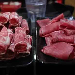 two trays of meat