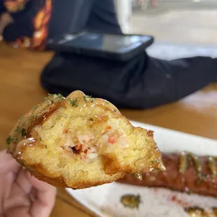 Inside the lobster corndog #2. Also empty like this business&apos;s conscious. Total rip off!