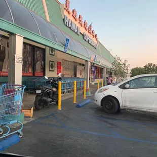 a car parked in front of the store