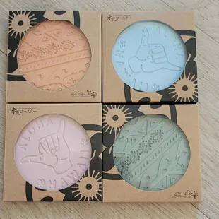 Great souvenir coasters made of tile material that absorbs water.