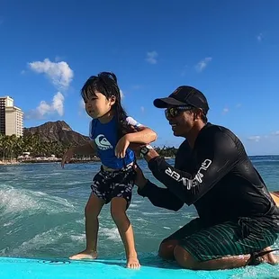 3 year old Surfing for the first time (tandem surfing)