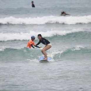 First time surfer getting it down! We have a high rate of standing up on the wave! We&apos;ll get you standing up on your wave!