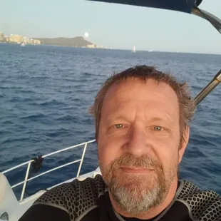 The moon rising over Diamond Head. Before a night dive.