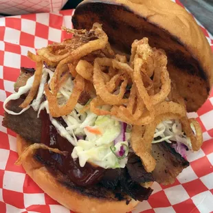 &quot;Beef Brisket Sandwich,&quot; complete with onion rings inside.