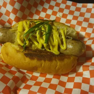 a hot dog in a basket