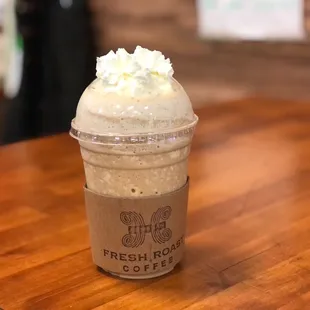 a cup of coffee on a table