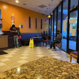 a man sitting at a counter
