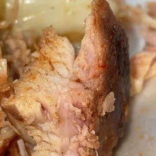 Raw undercooked chicken