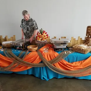 While they were setting up. They added tropical greenery to this. Gorgeous!