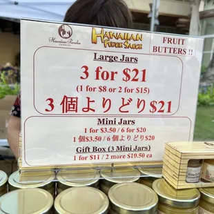 a sign for sale at a market