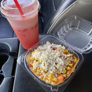 a plastic container with rice and a drink