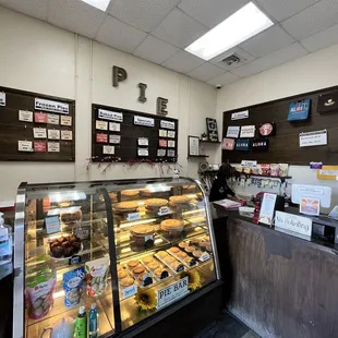 a display case with a variety of pastries