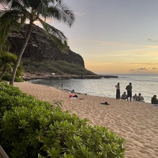 See homeless encampment at the base of the hill. Just expand the photos and look at the white EZ up.
