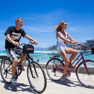 Bike riding through Waikiki.