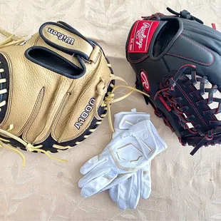 New fielding glove, catcher's glove and batting gloves.  Thanks, Coach Mus!