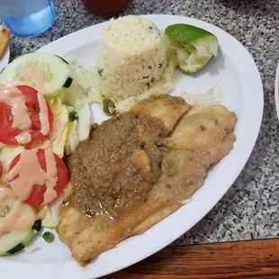 Garlic fish, queso papusos, jalapeno rice.