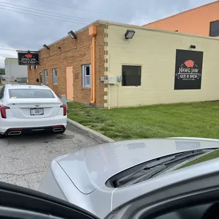 a car parked in front of a building