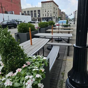 They have a few tables for sitting out front