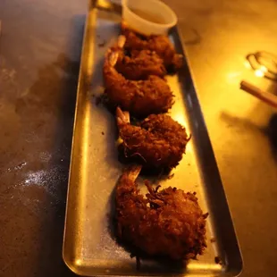 fried donuts on a tray