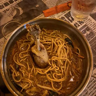 duck curry with a fried duck leg