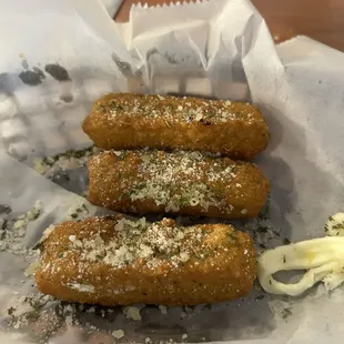 four doughnuts in a basket