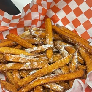 Sweet sweet potato fries Not sure the white stuff BUT IT WAS GOOD