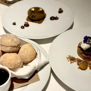 Beignets, a hazelnut dessert (top of photo) and crème brûlée (top the right)