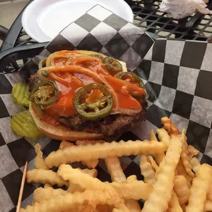 Buffalo Bill Burger.  Grilled onions, grilled jalapeños and buffalo sauce. Tasty.