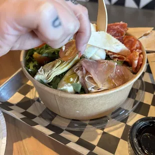 Already dipping into the Italian salad.