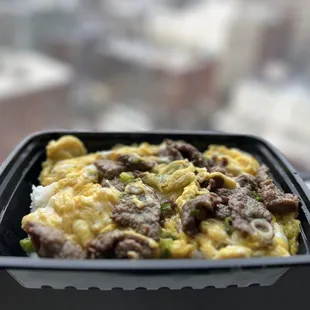 an omelet with meat and vegetables