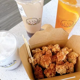 a box of fried chicken and a drink