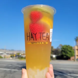 signature fruit fusion green tea with lychee jelly (100% sweetness, light ice)