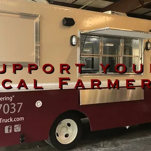 a food truck with the words support your local farmers