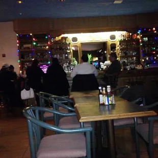 people sitting at a bar
